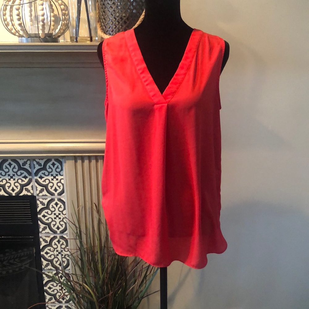 Red sleeveless blouse, Size L.